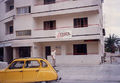 Stuart during his 1994 visit standing outside the first CYBER KIDS Branch of at Acropolis below the CNTI office